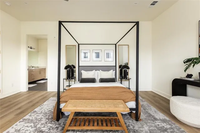 a living room with furniture and a rug