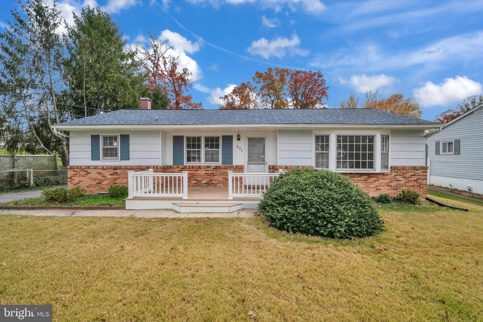 front view of a house with a patio