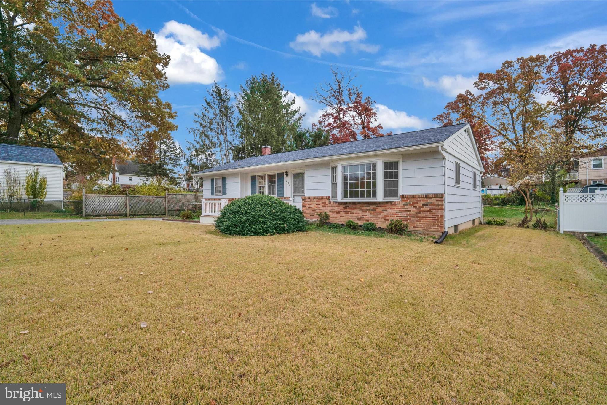 697 West Maple Road Linthicum Heights, MD 21090 - Photo 5 of 36 a view of a house with a yard and garage