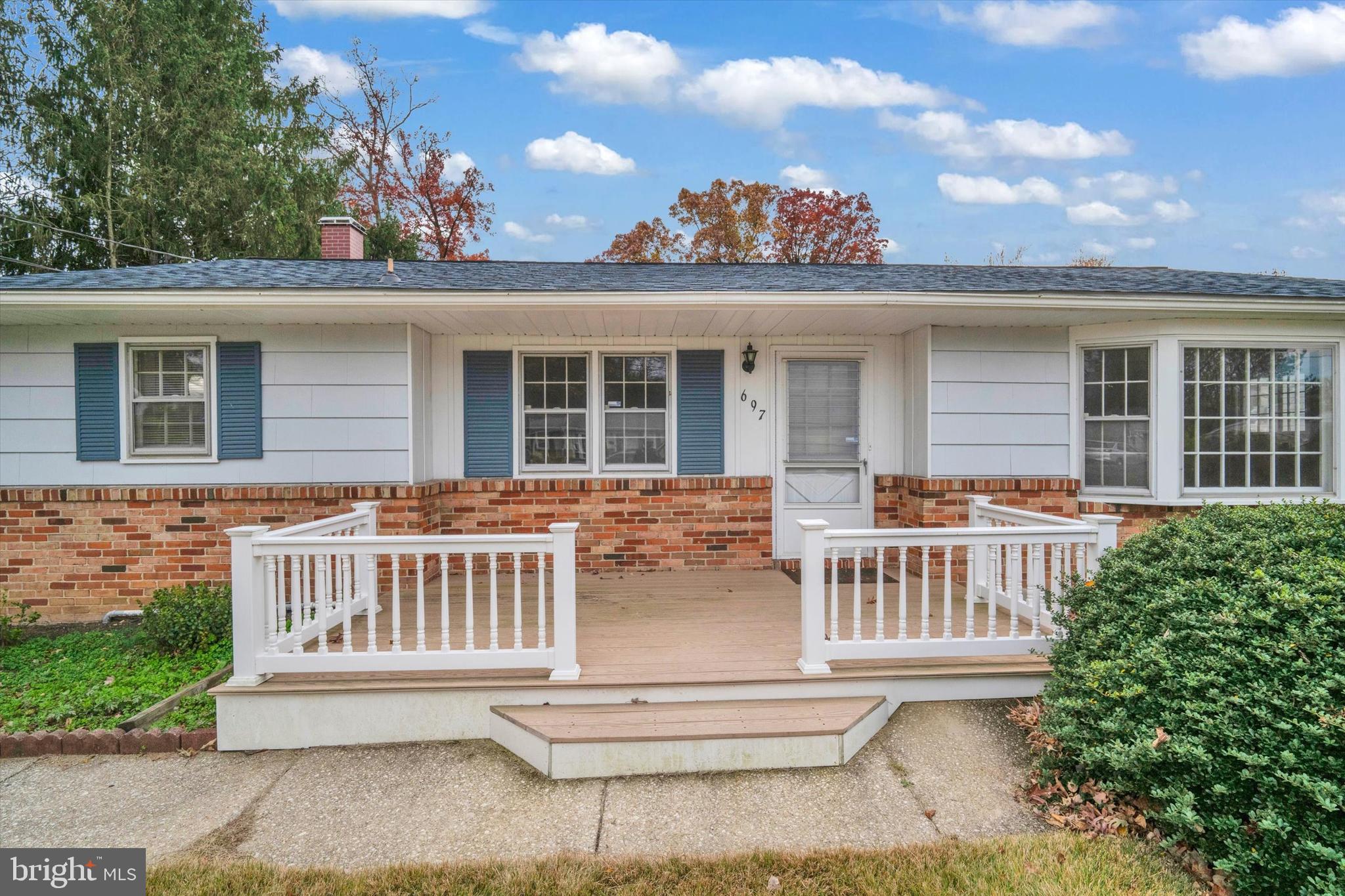 697 West Maple Road Linthicum Heights, MD 21090 - Photo 6 of 36 front view of a house with a porch