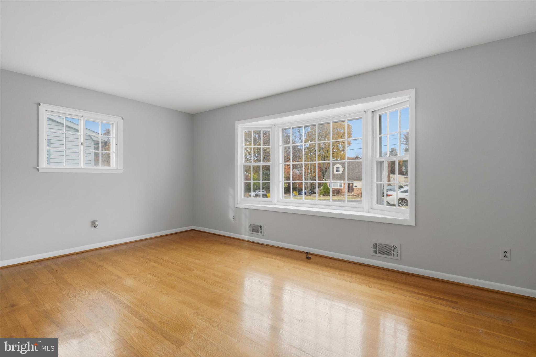 697 West Maple Road Linthicum Heights, MD 21090 - Photo 8 of 36 a view of an empty room with a window