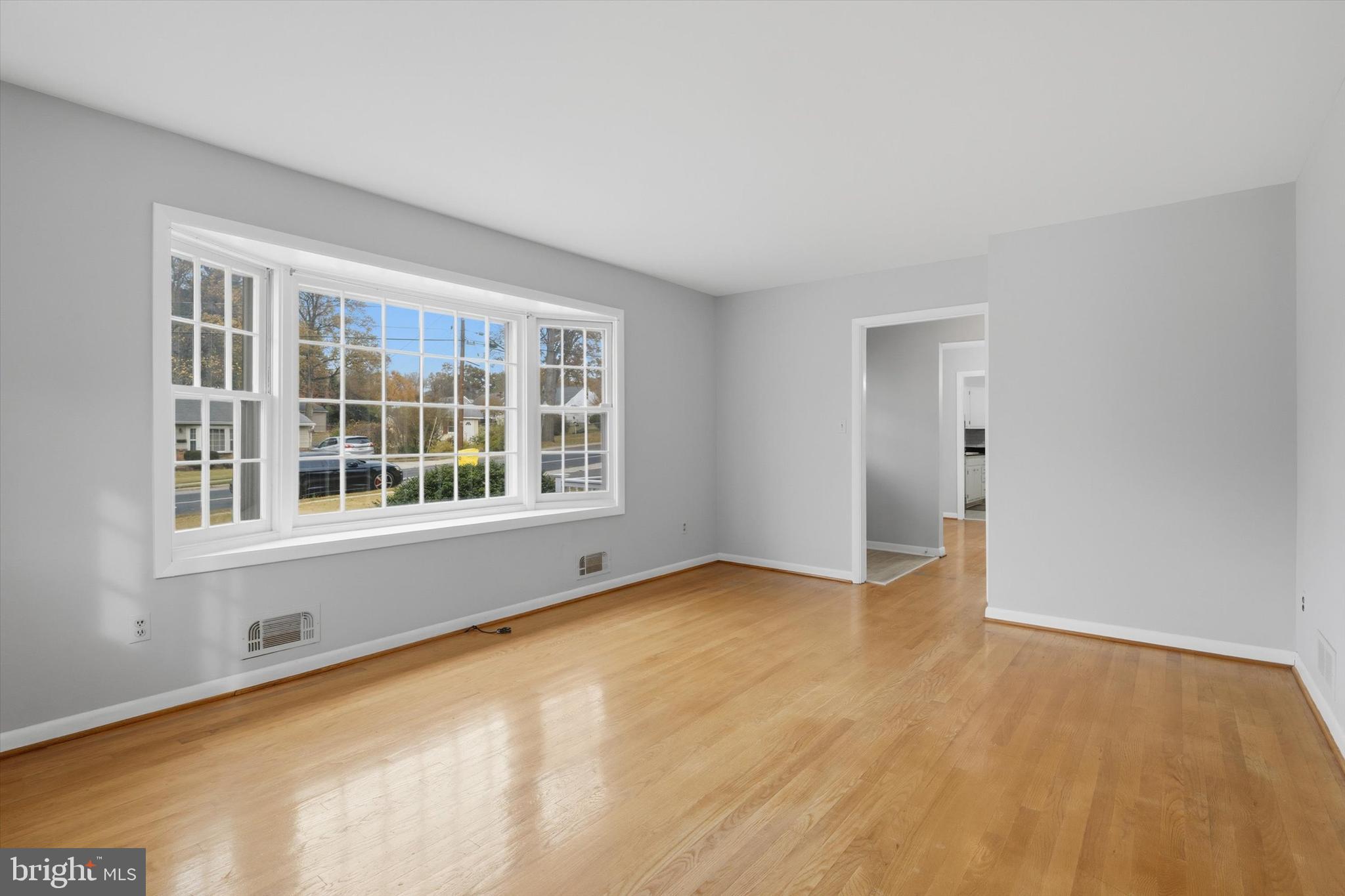 697 West Maple Road Linthicum Heights, MD 21090 - Photo 9 of 36 a view of an empty room with a window