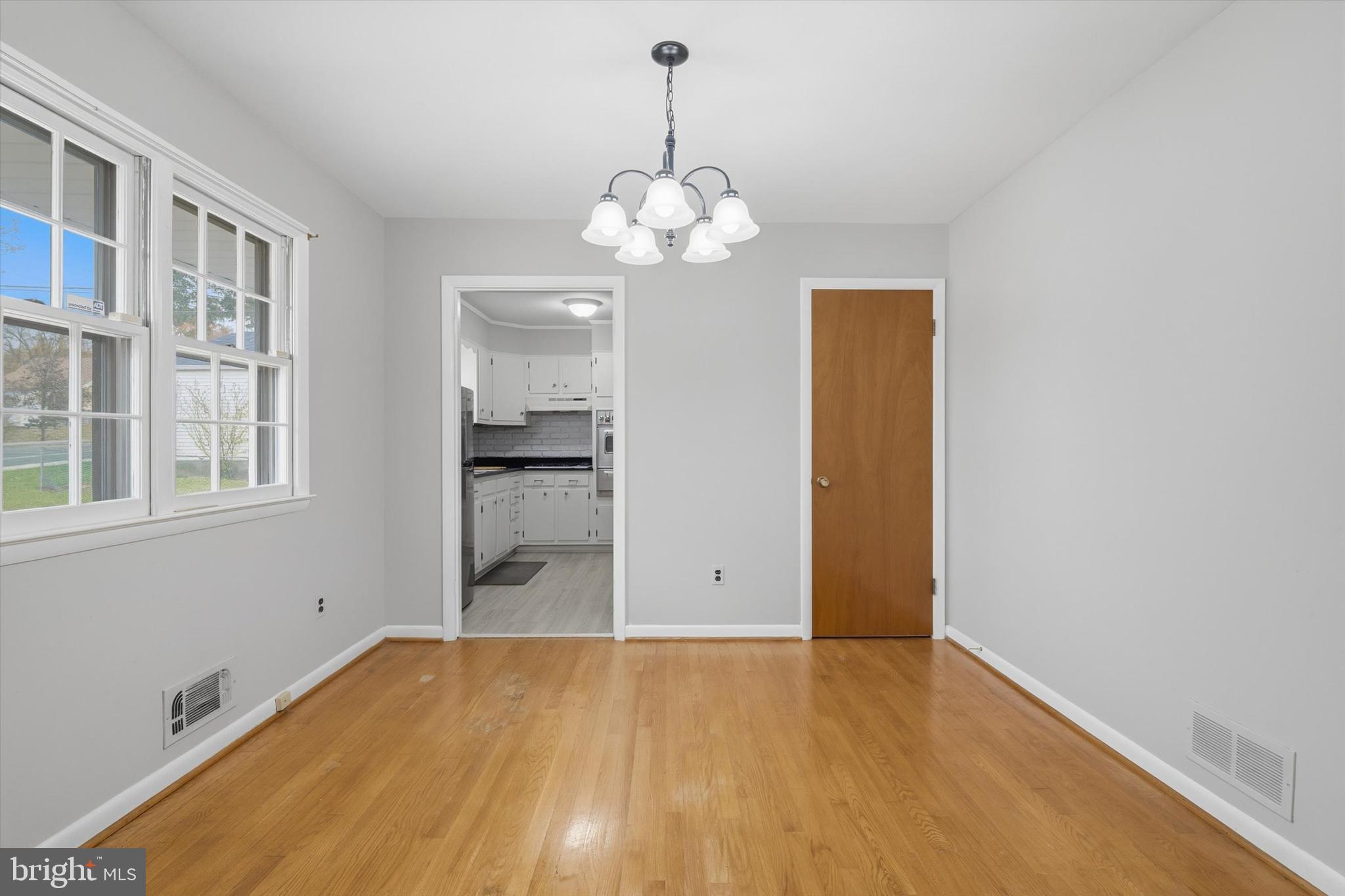 697 West Maple Road Linthicum Heights, MD 21090 - Photo 10 of 36 a view of an empty room with a window