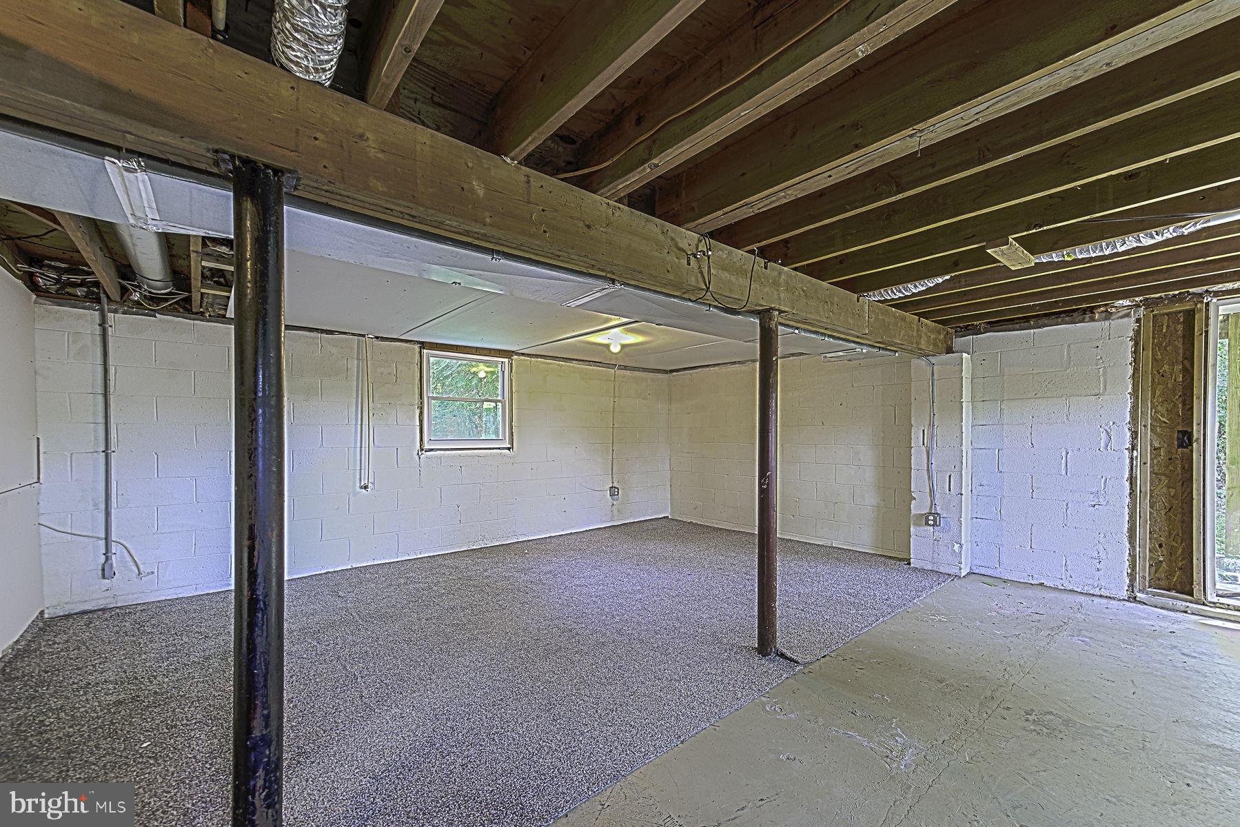 20121 Sparta Road Milford, VA 22514 - Photo 27 of 31 Spacious, versatile basement retreat.