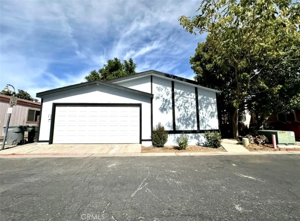 80 East Dawes Street, Unit 135 Perris, CA 92571 - Photo 1 of 1 a view of a house with a snow in the yard