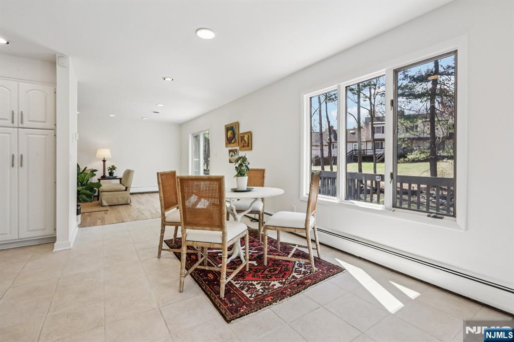 11 Carlough Road Upper Saddle River, NJ 07458 - Photo 17 of 41 a living room with furniture and a window