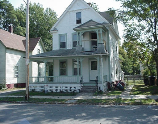 167 Johnson Street Springfield, MA 01108 - Photo 1 of 1 a front view of a house with a yard