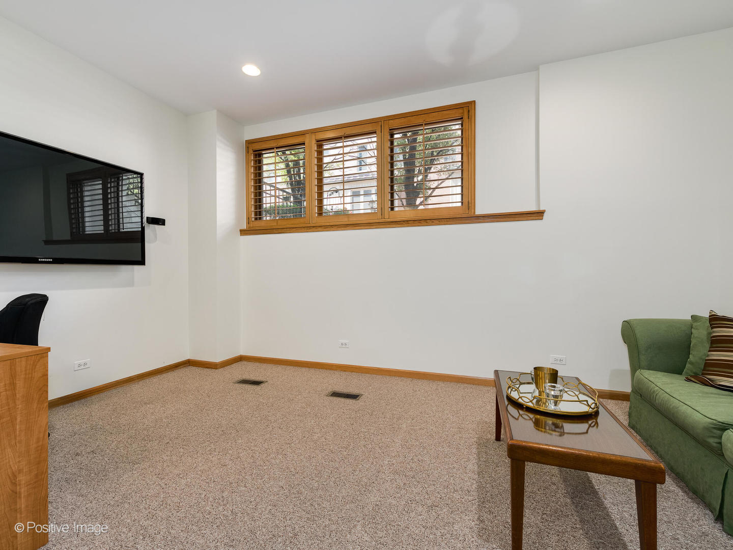 1215 West Lexington Street, Unit E Chicago, IL 60607 - Photo 15 of 21 a bedroom with furniture and a window