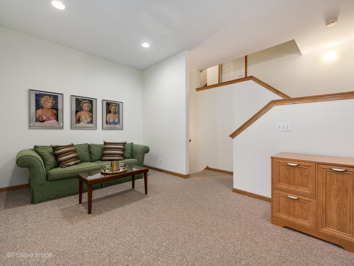 1215 West Lexington Street, Unit E Chicago, IL 60607 - Photo 16 of 21 a living room with furniture and a lamp