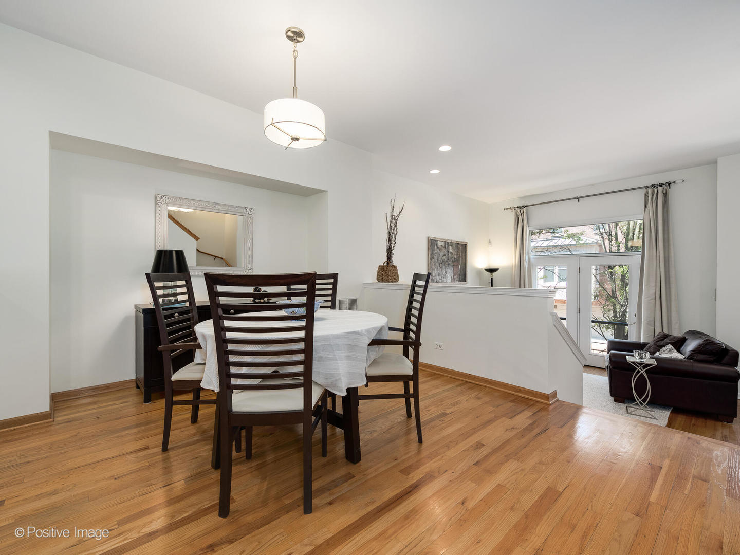 1215 West Lexington Street, Unit E Chicago, IL 60607 - Photo 5 of 21 a view of a a dining room with furniture window and wooden floor