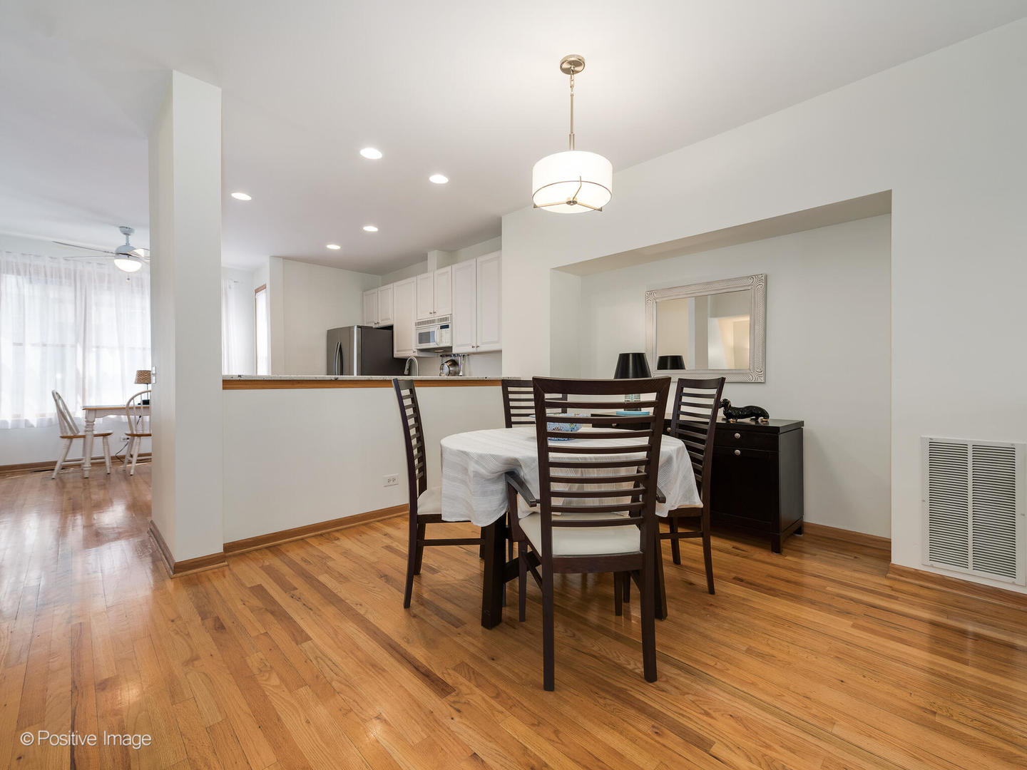 1215 West Lexington Street, Unit E Chicago, IL 60607 - Photo 6 of 21 a view of a dining room with furniture and wooden floor