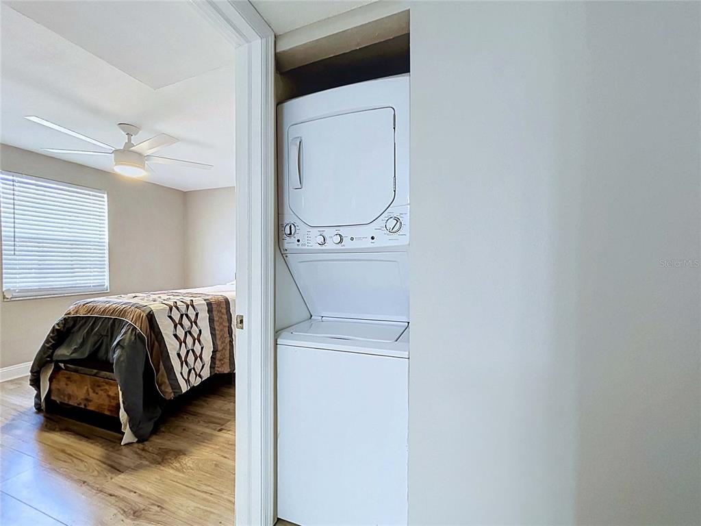 4227 Sheldon Place New Port Richey, FL 34652 - Photo 20 of 25 a bedroom with a bed and a mirror