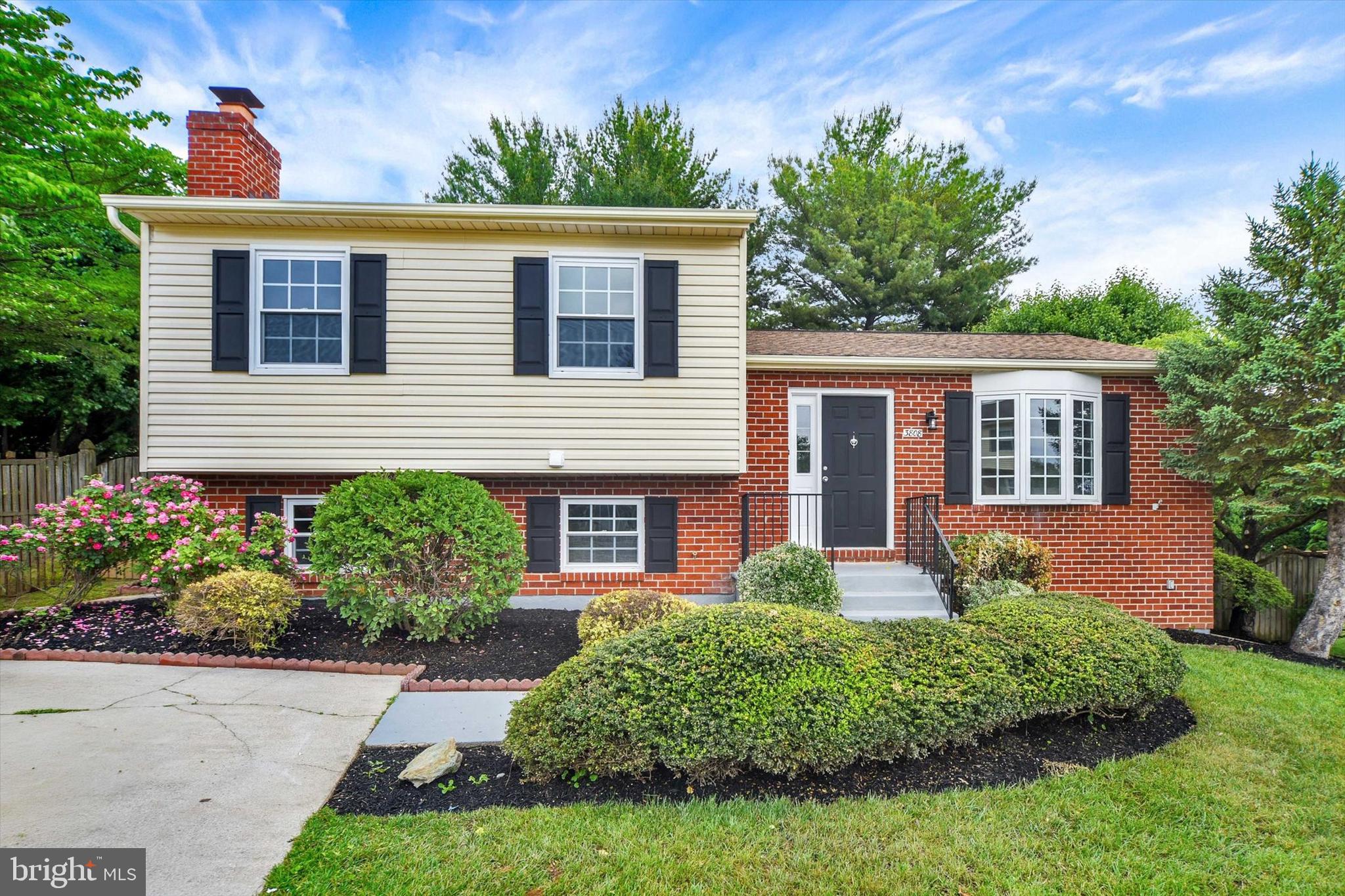 3808 Perryhurst Place Baltimore, MD 21236 - Photo 1 of 29 front view of a house with a yard