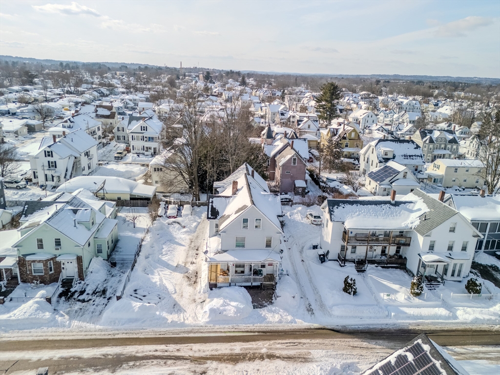 103 Ash Street Nashua, NH 03060 - Photo 34 of 36 an aerial view of residential houses with outdoor space