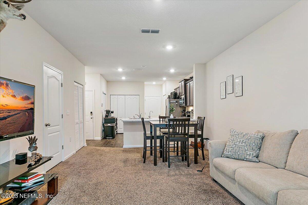 7895 Echo Springs Road Jacksonville, FL 32256 - Photo 3 of 15 03-Living Room & Dining Room