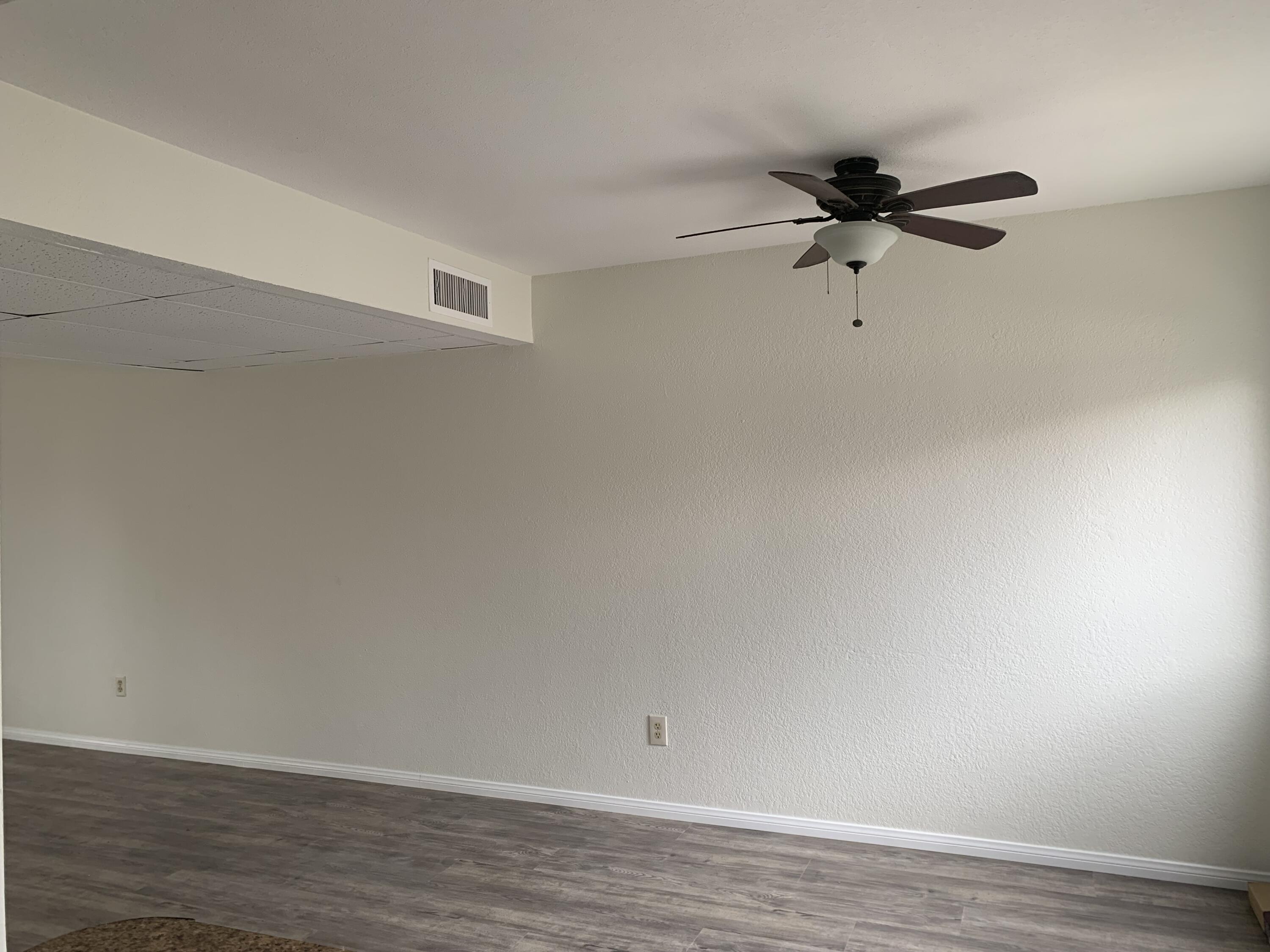 40225 Harris Lane, Unit 304 Palm Desert, CA 92211 - Photo 2 of 14 a view of a big room with wooden floor