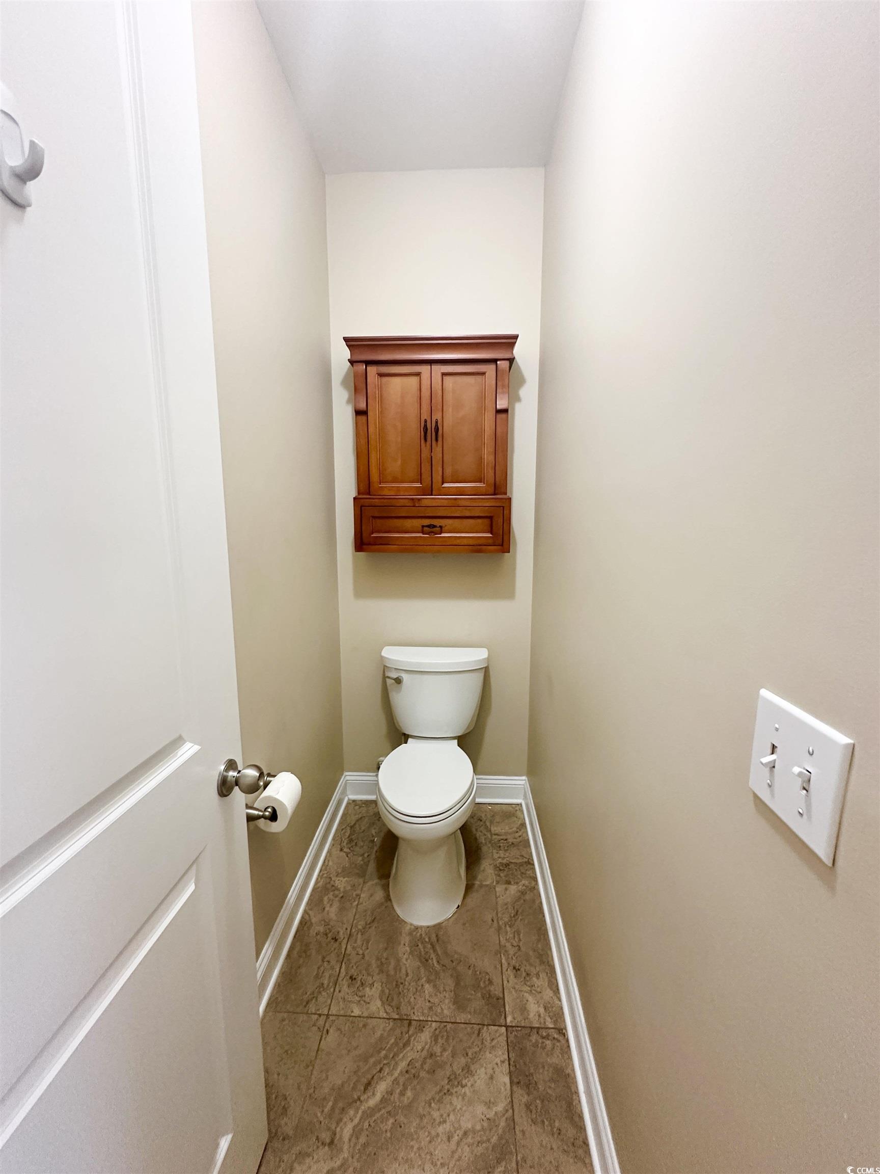 8472 Juxa Drive Myrtle Beach, SC 29579 - Photo 21 of 35 Bathroom featuring baseboards and toilet