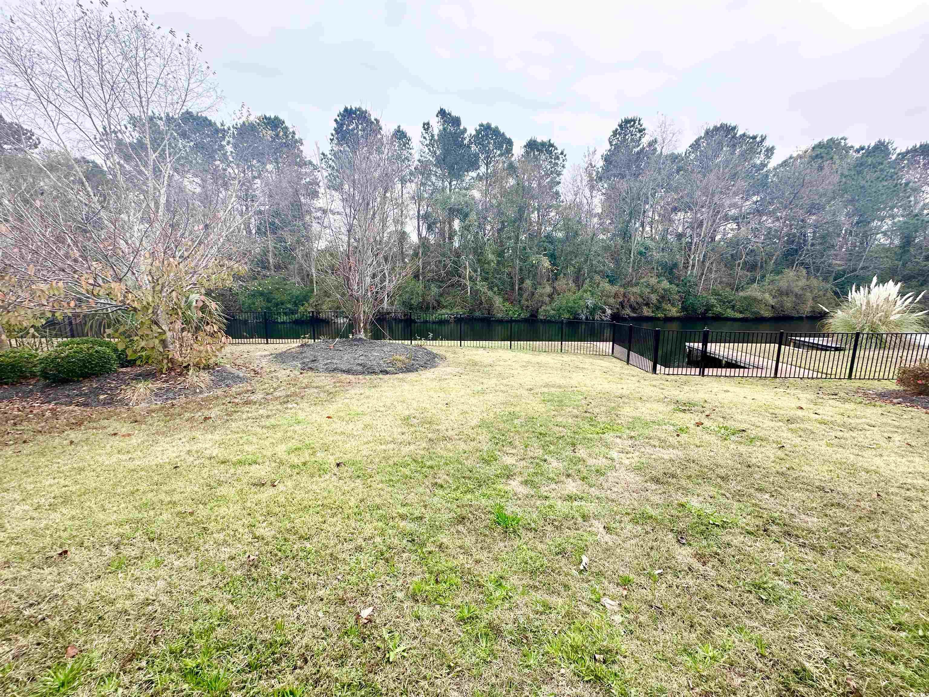 8472 Juxa Drive Myrtle Beach, SC 29579 - Photo 28 of 35 Fenced backyard featuring a water view