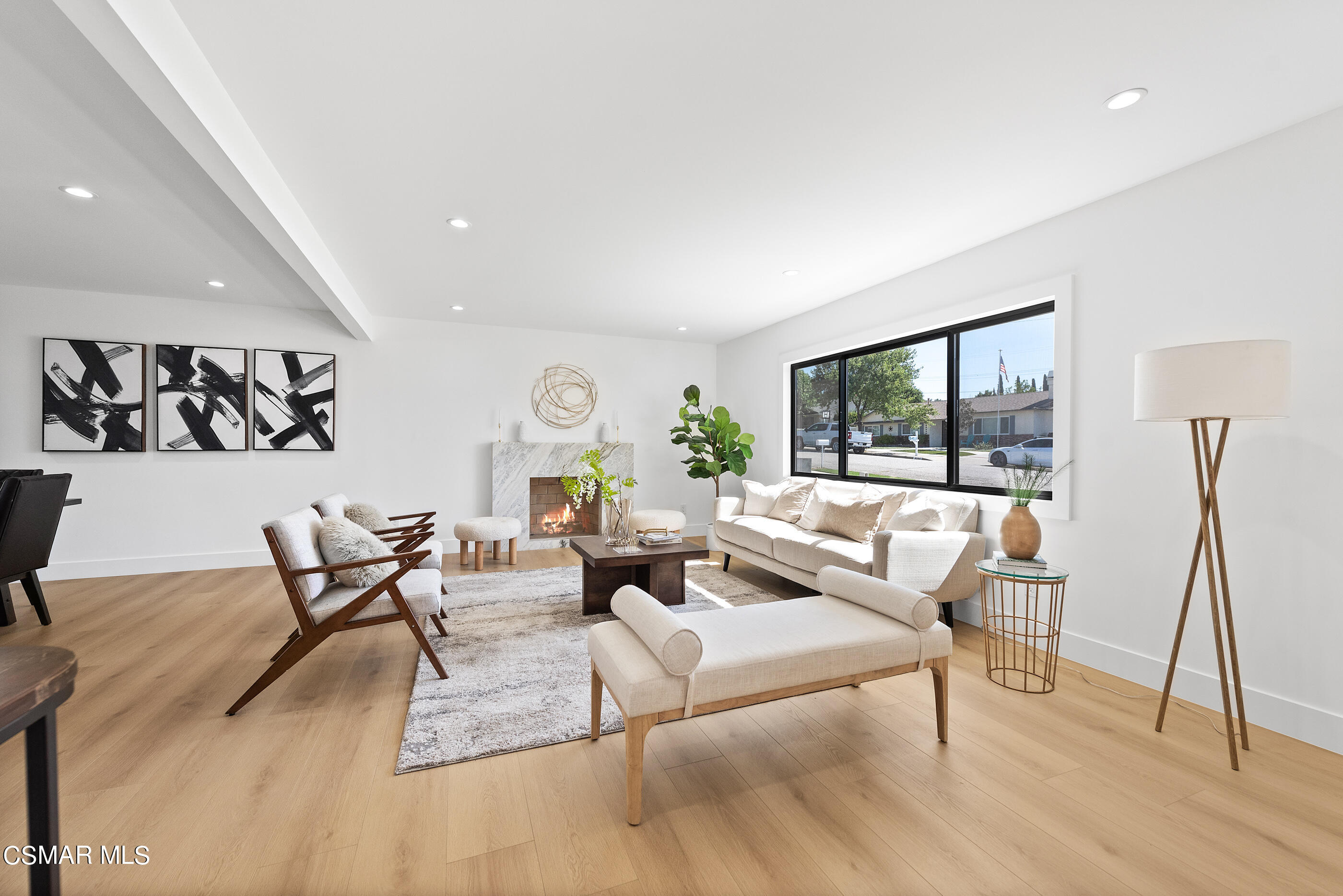 3343 Austin Avenue Simi Valley, CA 93063 - Photo 7 of 40 a living room with furniture and a large window