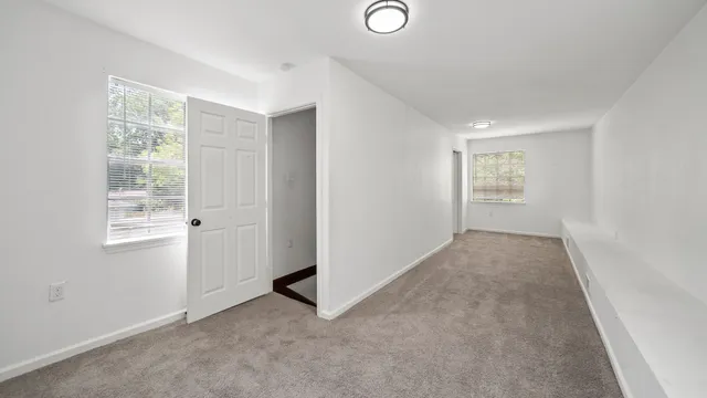 an empty room with windows