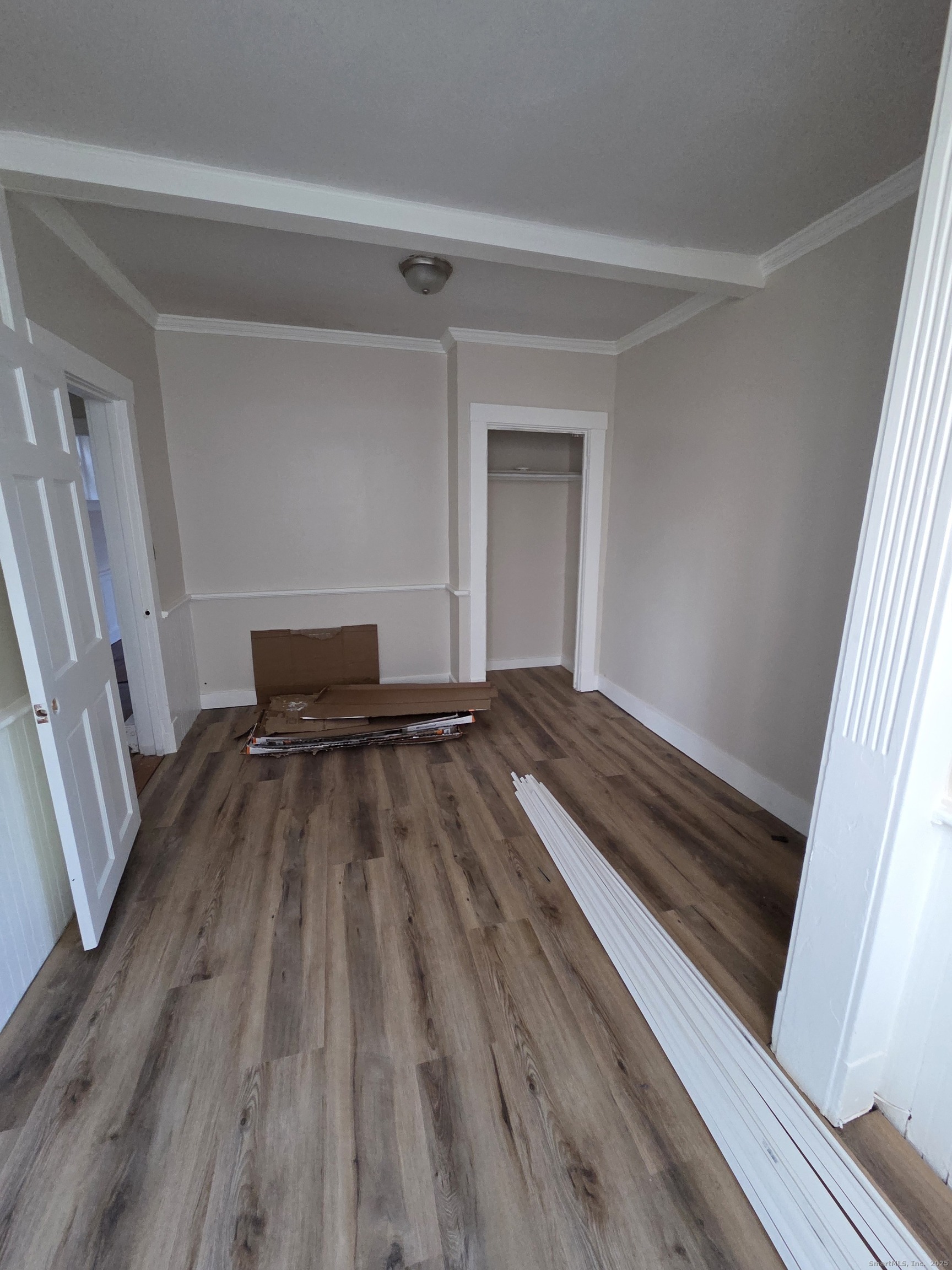 32 Channing Street, Unit 1 New London, CT 06320 - Photo 11 of 13 a view of wooden floor in a room