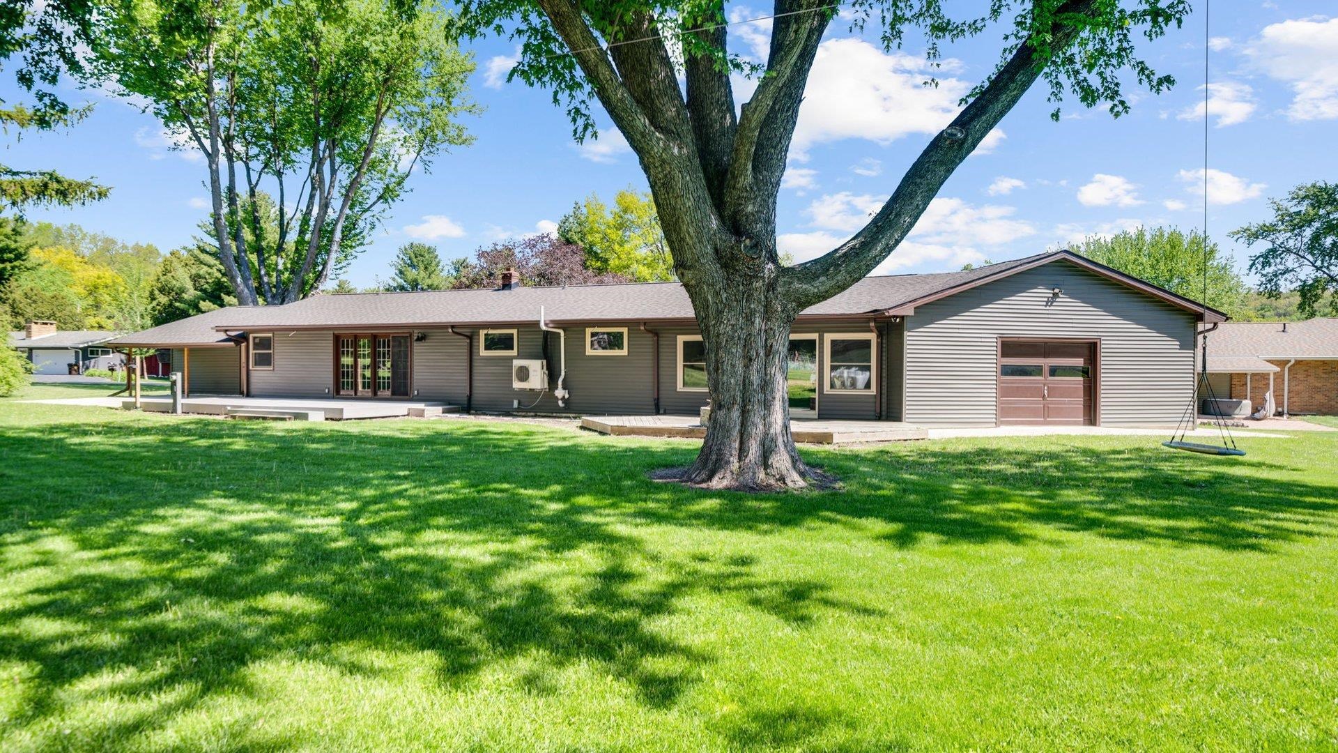 313 West Margaret Fuller Road Oregon, IL 61061 - Photo 41 of 46 a front view of house with yard and green space