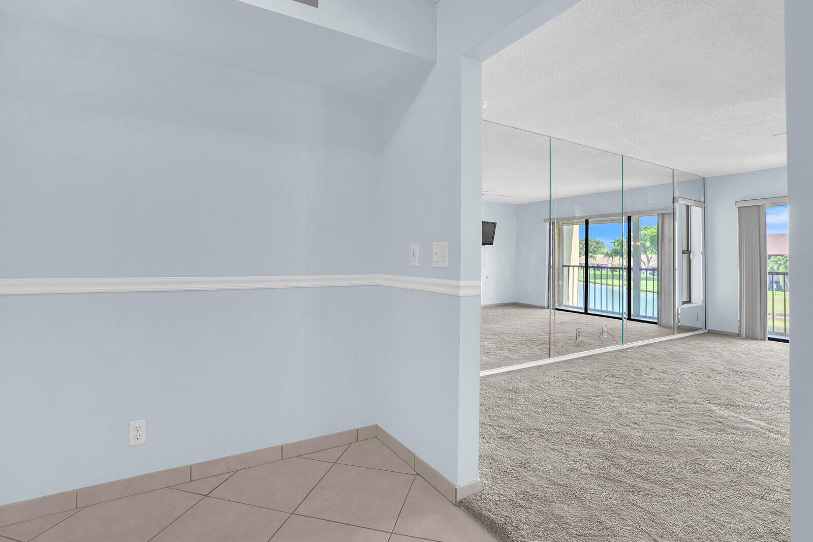 826 Sky Pine Way, Unit G2 Greenacres, FL 33415 - Photo 18 of 30 wooden floor in an empty room with a window