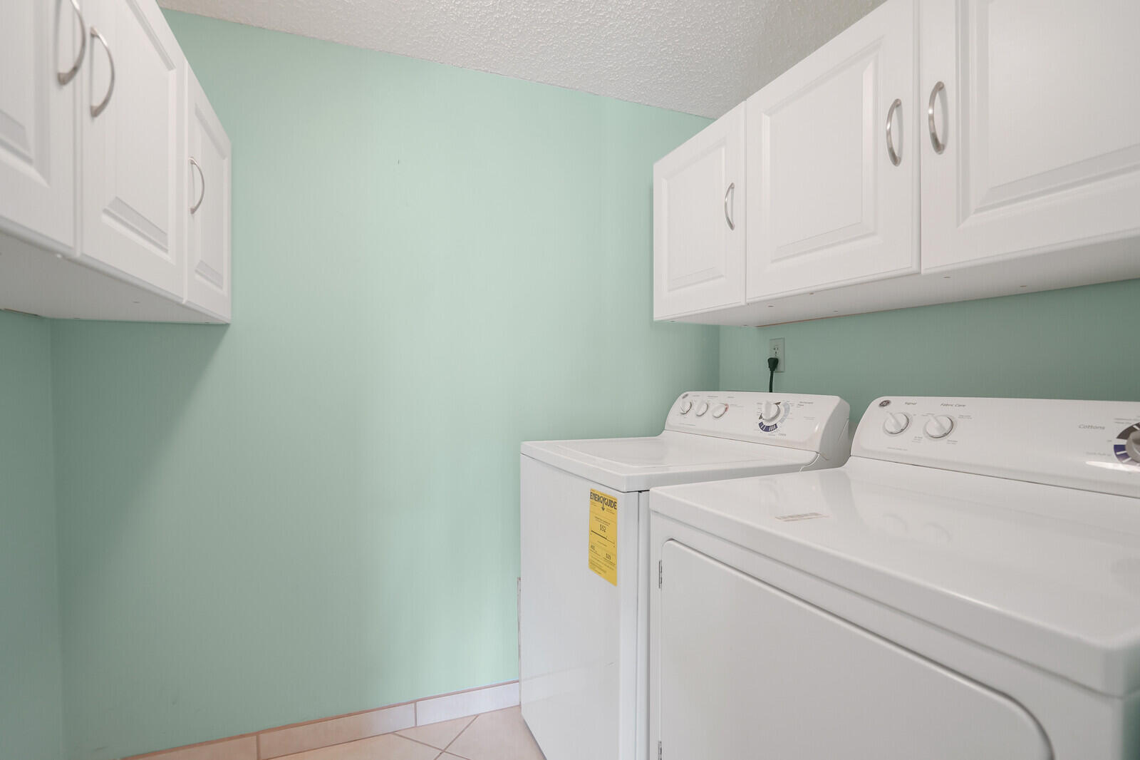 826 Sky Pine Way, Unit G2 Greenacres, FL 33415 - Photo 19 of 30 a utility room with dryer and washer