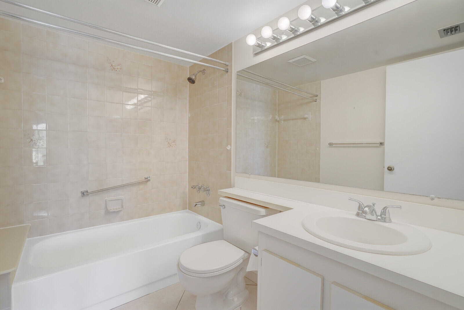 826 Sky Pine Way, Unit G2 Greenacres, FL 33415 - Photo 22 of 30 a bathroom with a sink a toilet and a bathtub