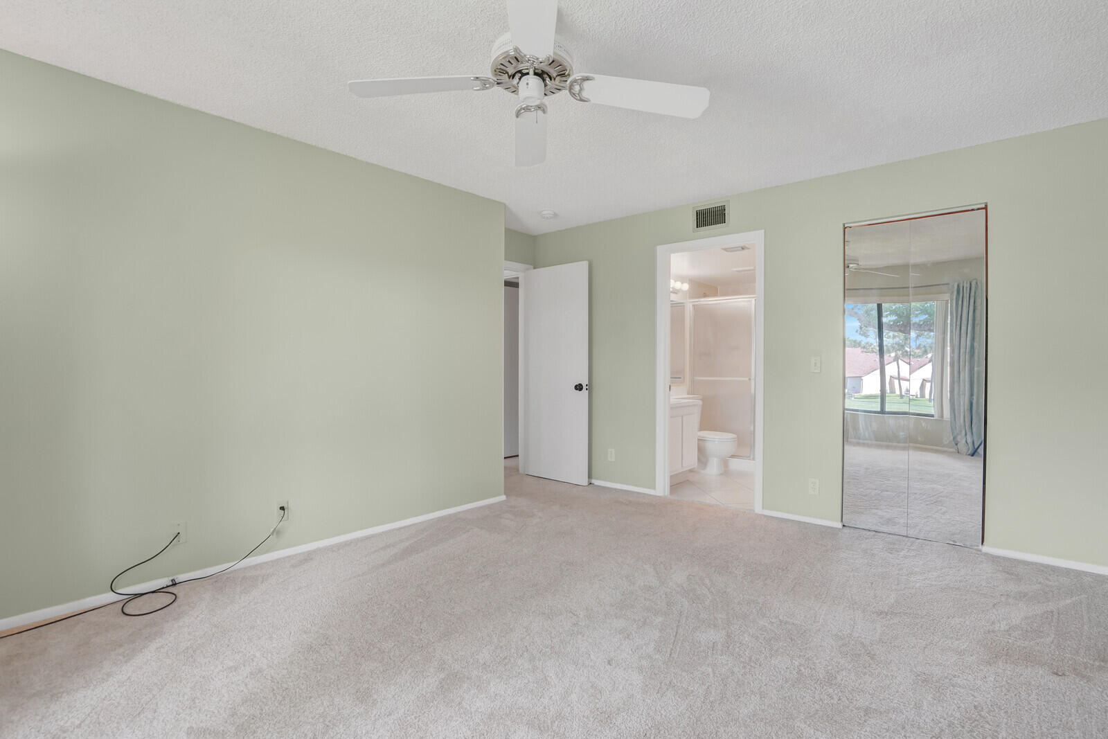 826 Sky Pine Way, Unit G2 Greenacres, FL 33415 - Photo 25 of 30 a view of an empty room with a window
