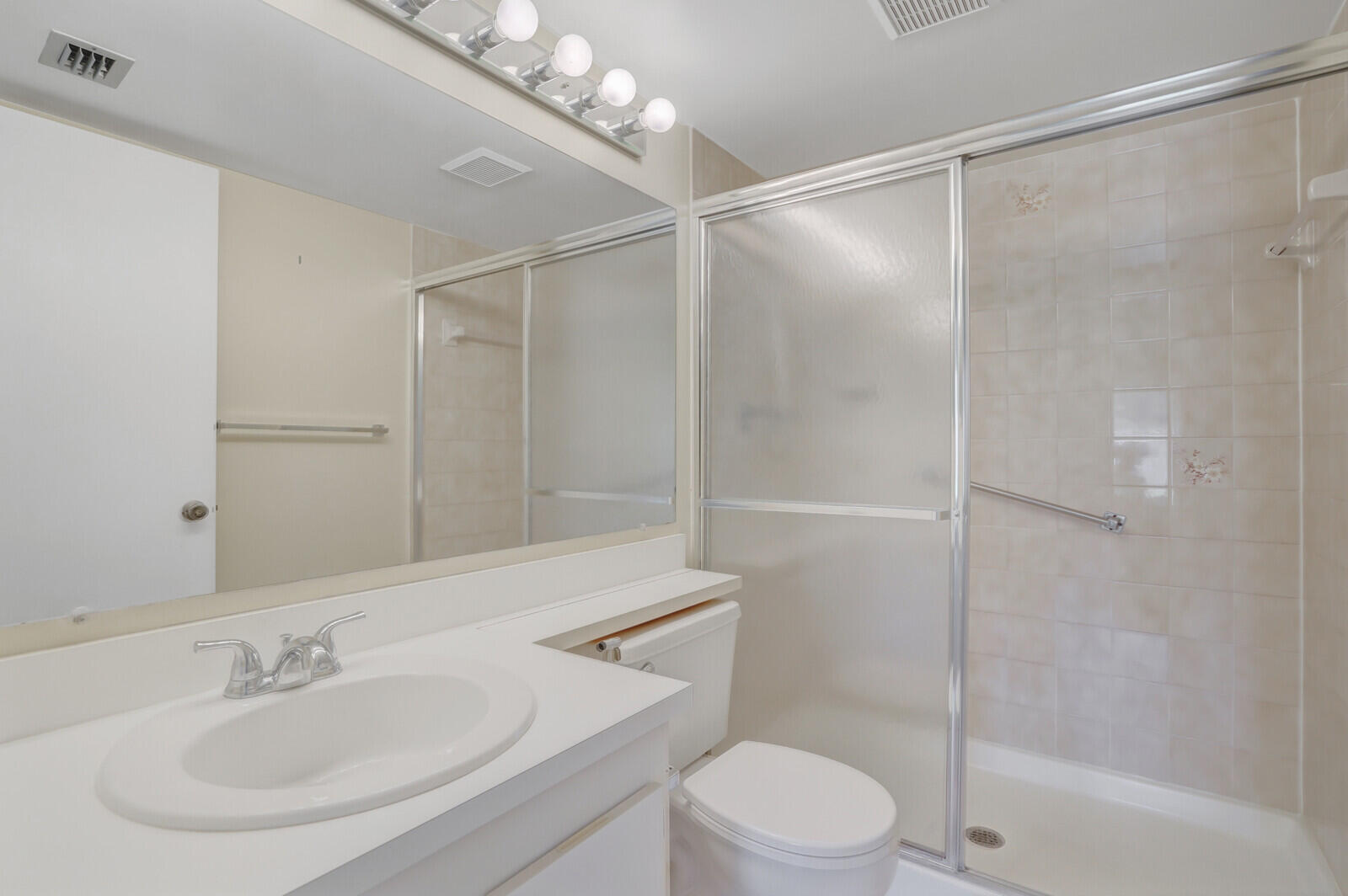 826 Sky Pine Way, Unit G2 Greenacres, FL 33415 - Photo 26 of 30 a bathroom with a shower and a sink