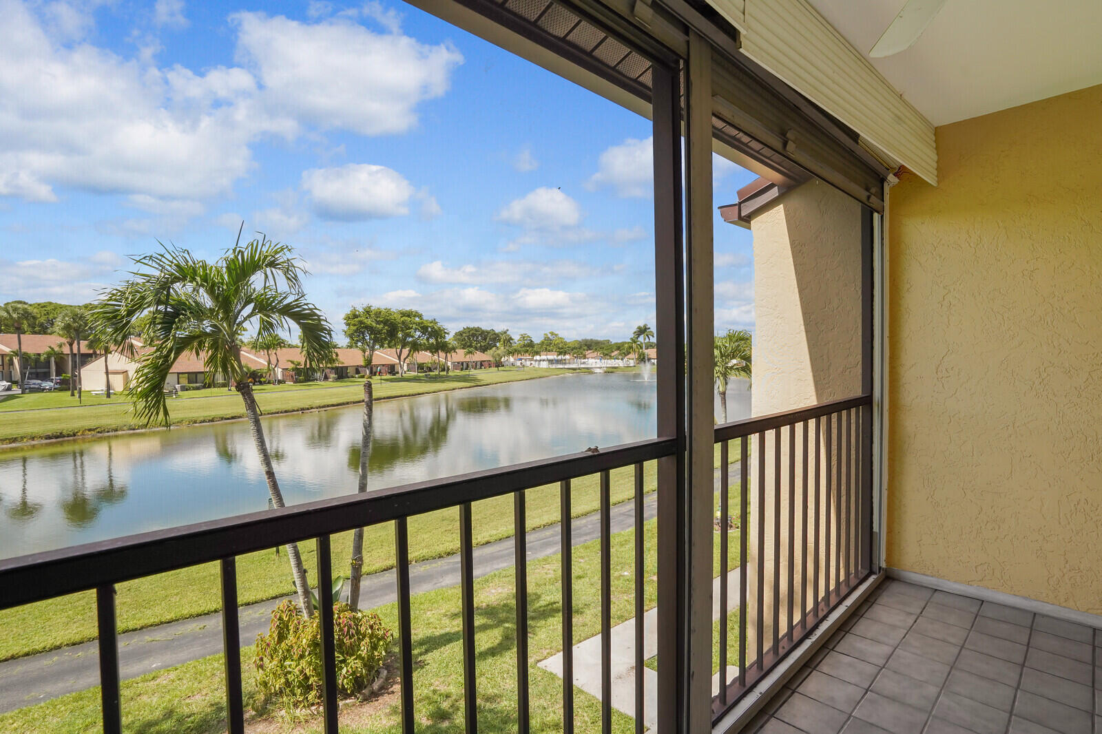 826 Sky Pine Way, Unit G2 Greenacres, FL 33415 - Photo 28 of 30 a view of lake from a balcony
