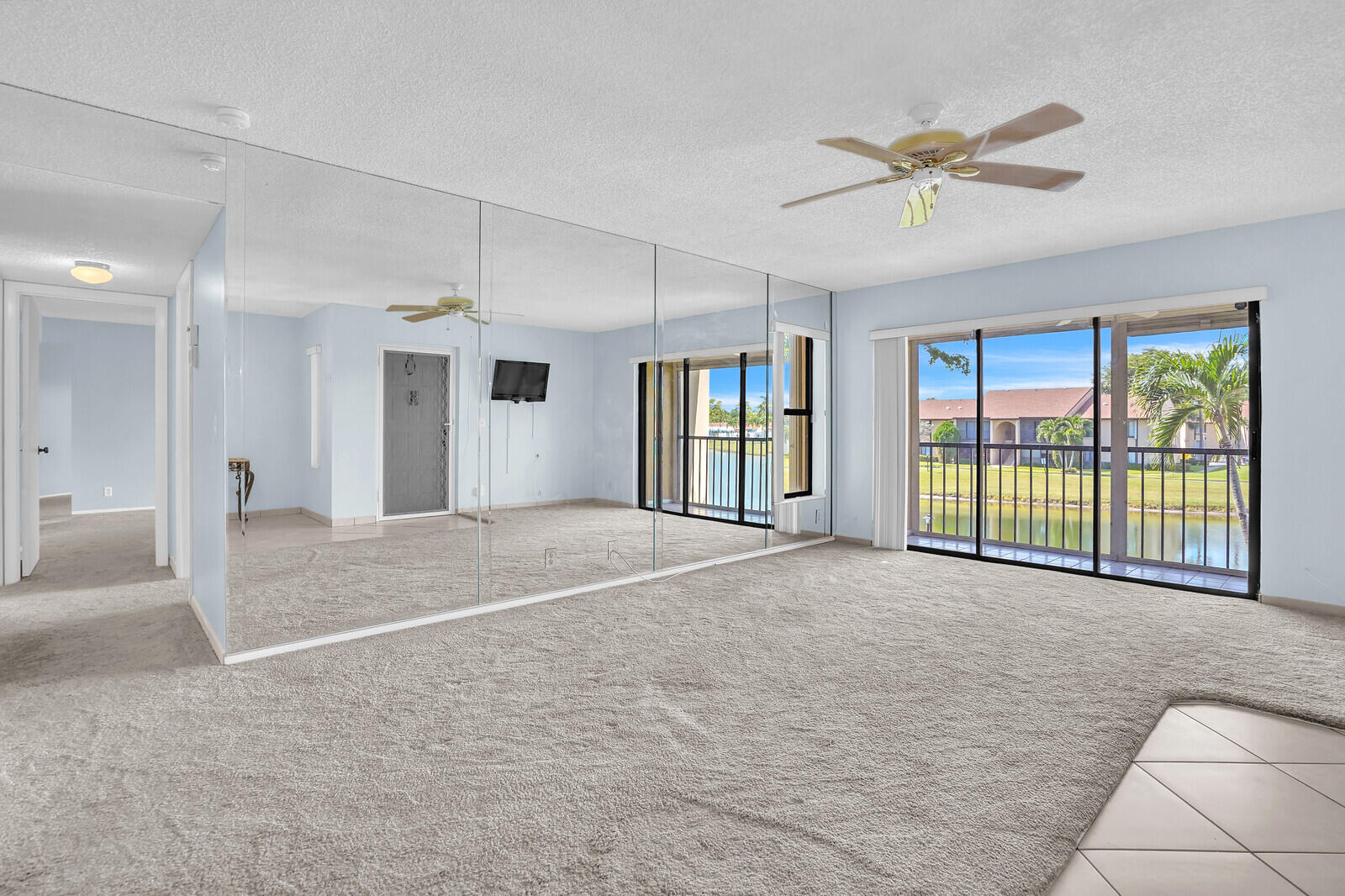 826 Sky Pine Way, Unit G2 Greenacres, FL 33415 - Photo 9 of 30 a view of an empty room with a window