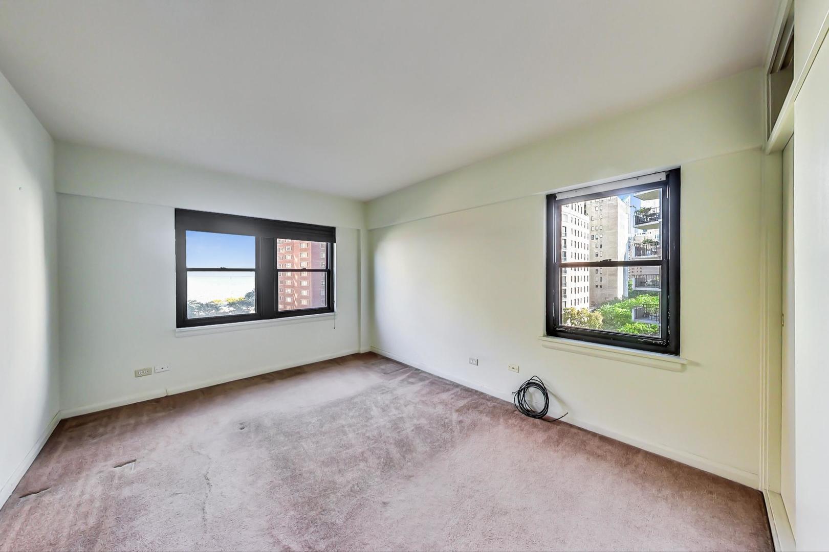 1350 North Astor Street, Unit 9B Chicago, IL 60610 - Photo 14 of 25 an empty room with windows