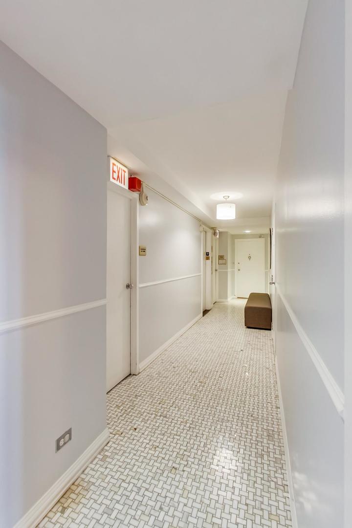 1350 North Astor Street, Unit 9B Chicago, IL 60610 - Photo 4 of 25 a view of a hallway to closet and a window