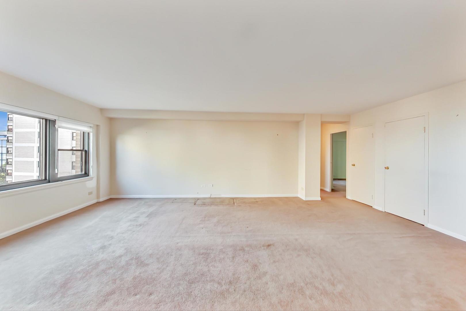 1350 North Astor Street, Unit 9B Chicago, IL 60610 - Photo 7 of 25 an empty room with windows