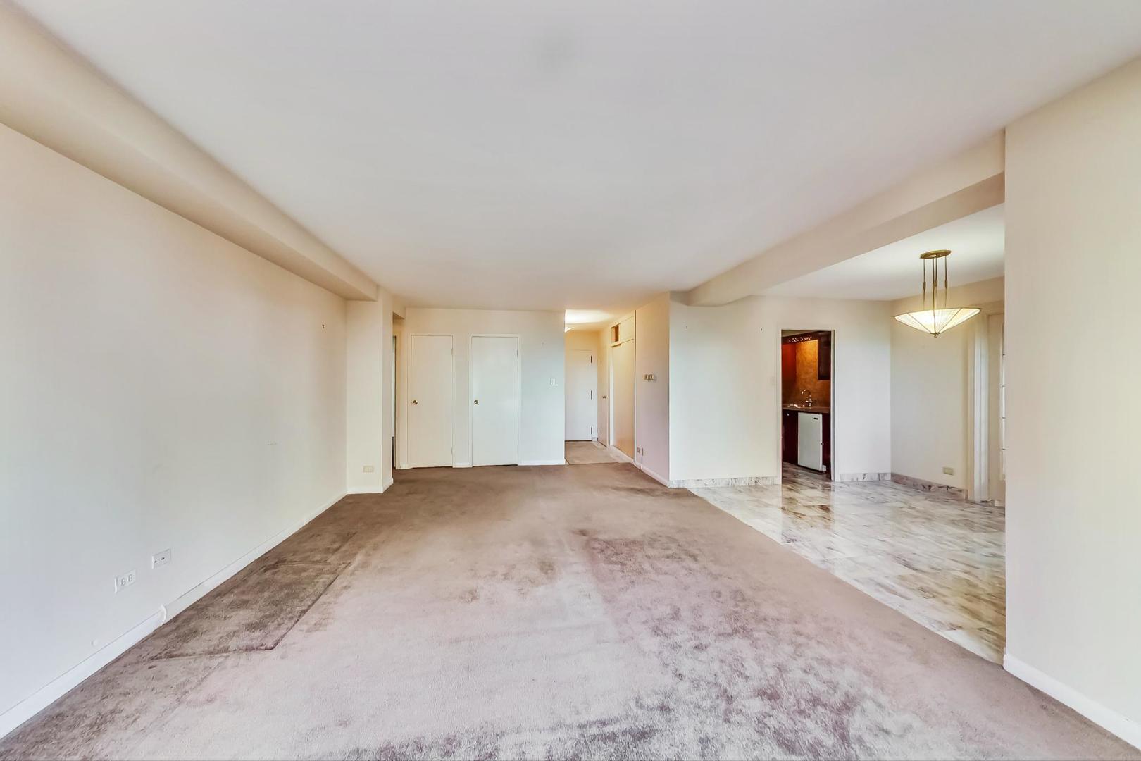 1350 North Astor Street, Unit 9B Chicago, IL 60610 - Photo 8 of 25 a view of an empty room and window