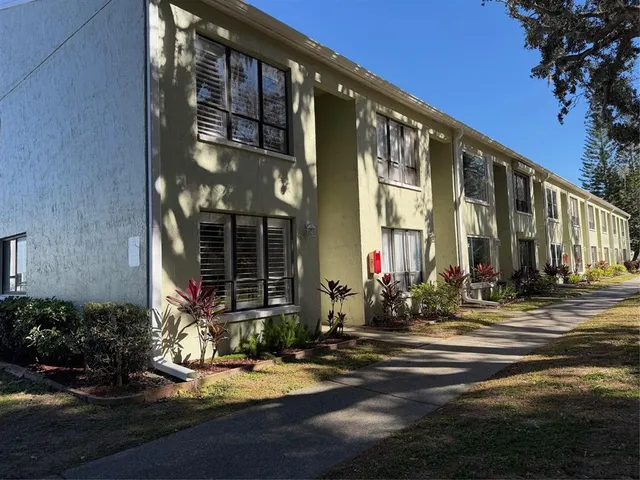 a front view of a building with street view