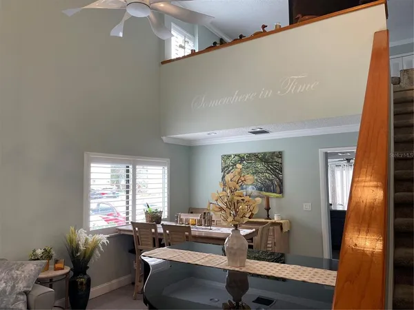 a bedroom with a bed and a television in it