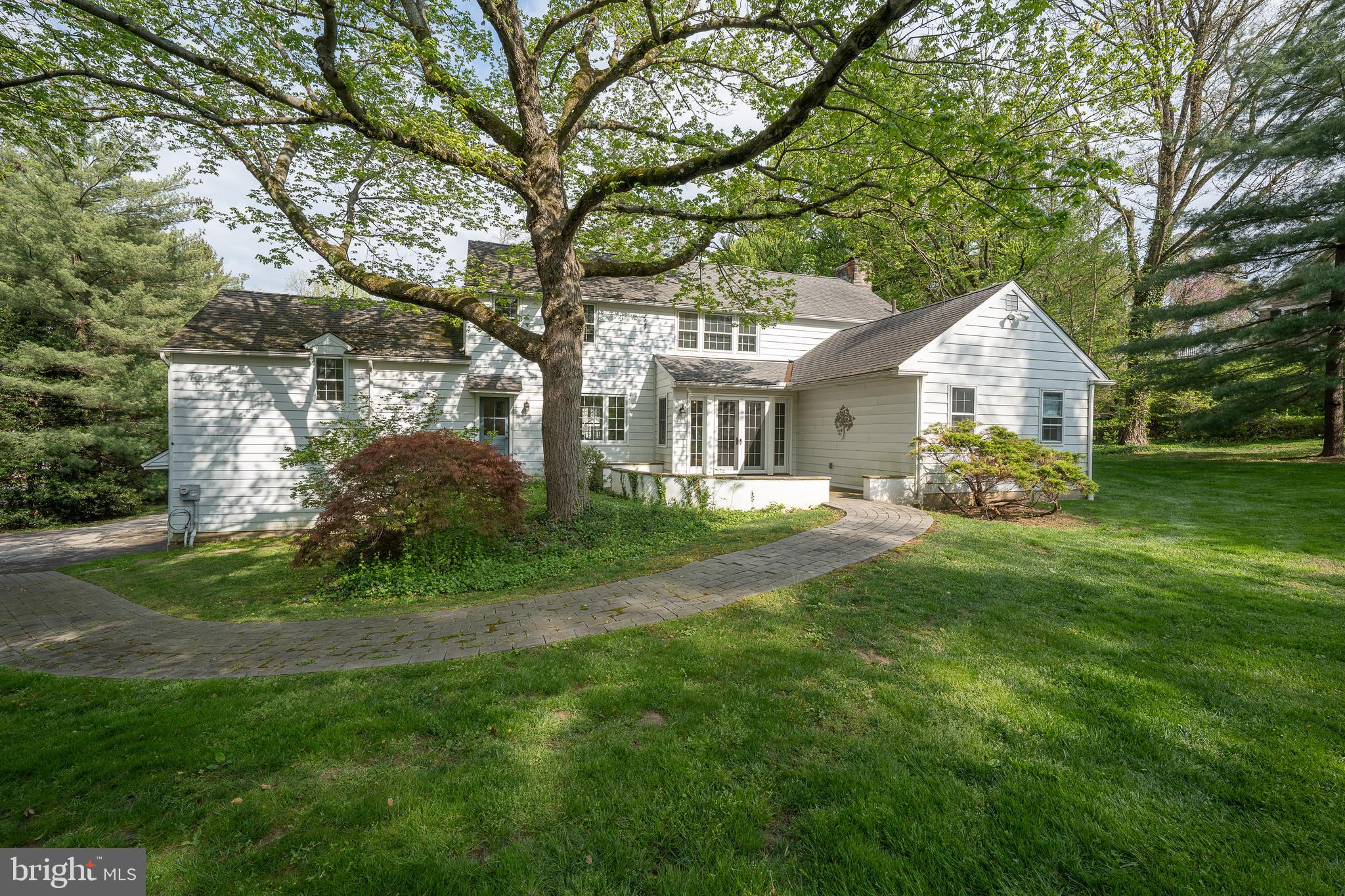 510 Lynmere Road Bryn Mawr, PA 19010 - Photo 41 of 44 a front view of a house with a garden