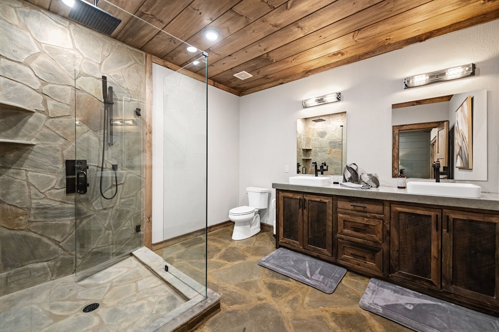 184 Spence Road Epworth, GA 30541 - Photo 20 of 62 a spacious bathroom with a double vanity sink a mirror and a shower
