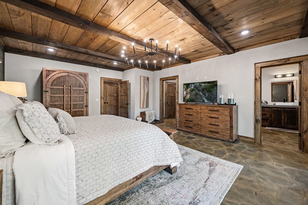 184 Spence Road Epworth, GA 30541 - Photo 26 of 62 a bed room with a bed and wooden floor