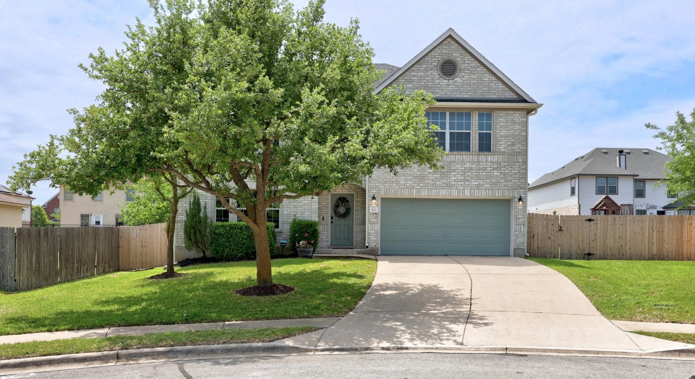 505 Dark Tree Lane Round Rock, TX 78664 - Photo 1 of 1 front view of a house with a yard