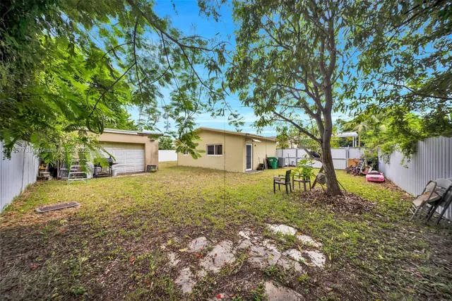 a house view with a garden space