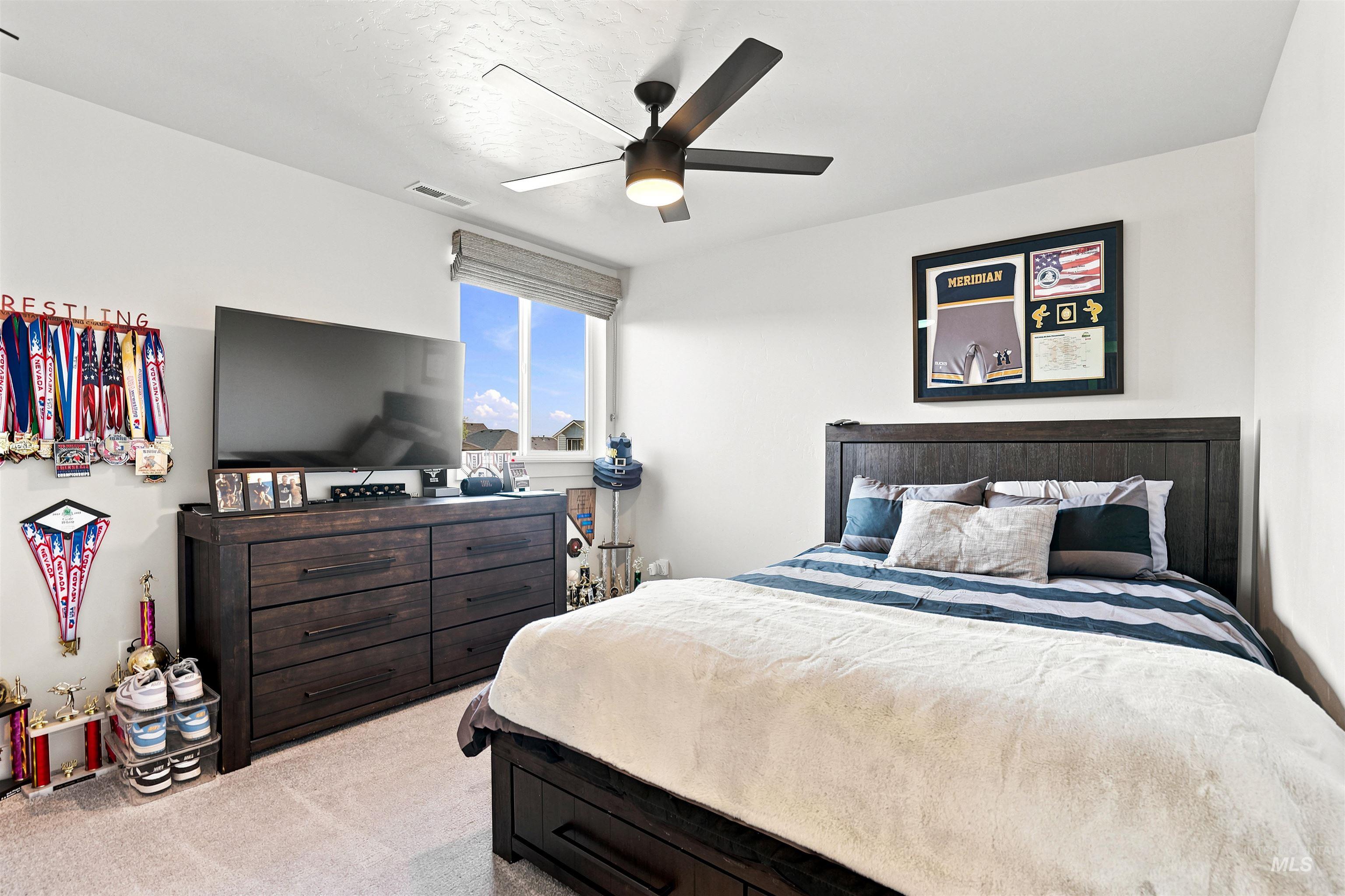 4323 West Ladle Rpds Drive Meridian, ID 83646 - Photo 34 of 49 Bedroom featuring light gray carpeting and white walls