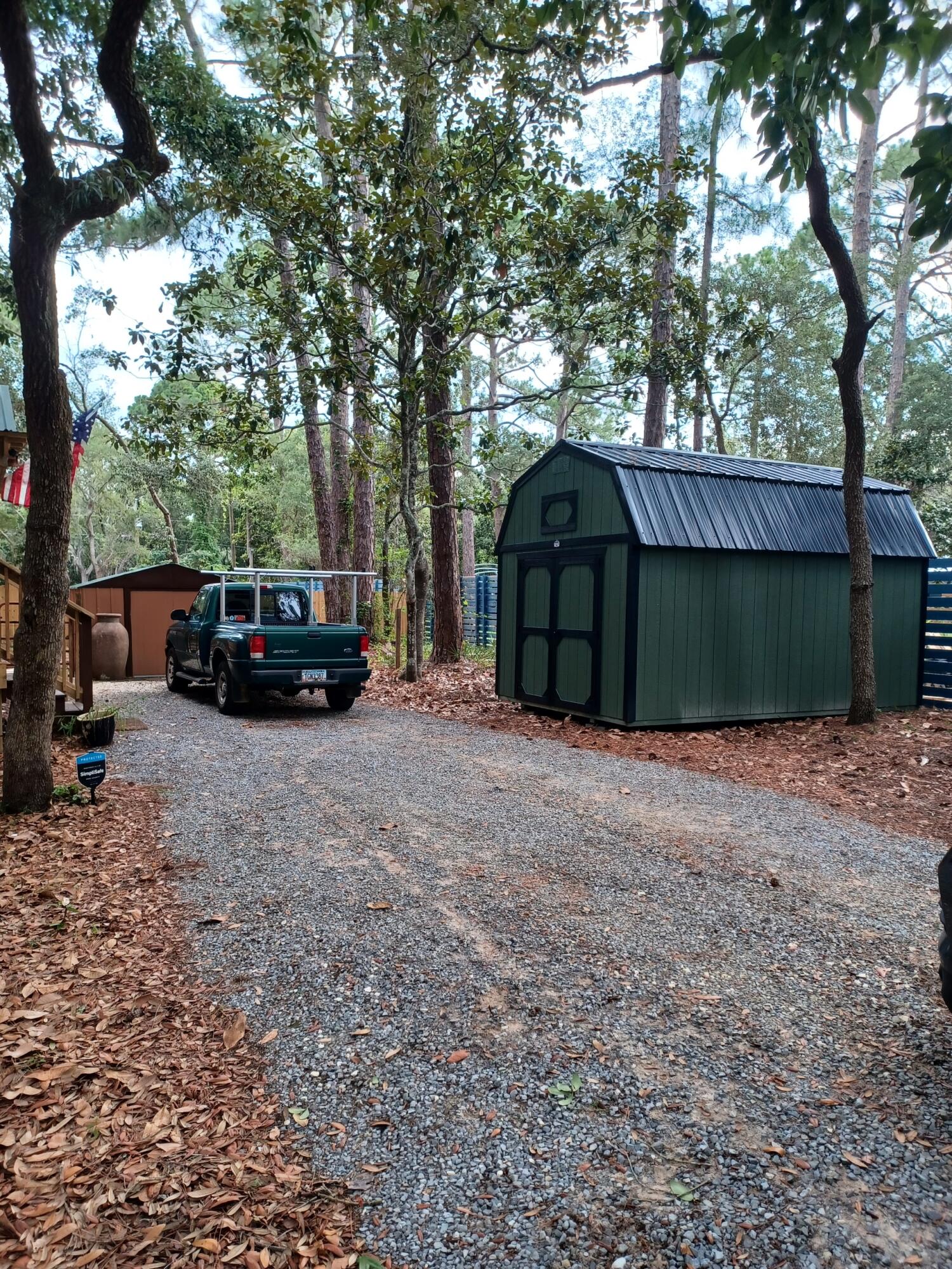 155 Madge Lane Santa Rosa Beach, FL 32459 - Photo 13 of 17 a view of a yard with large tree