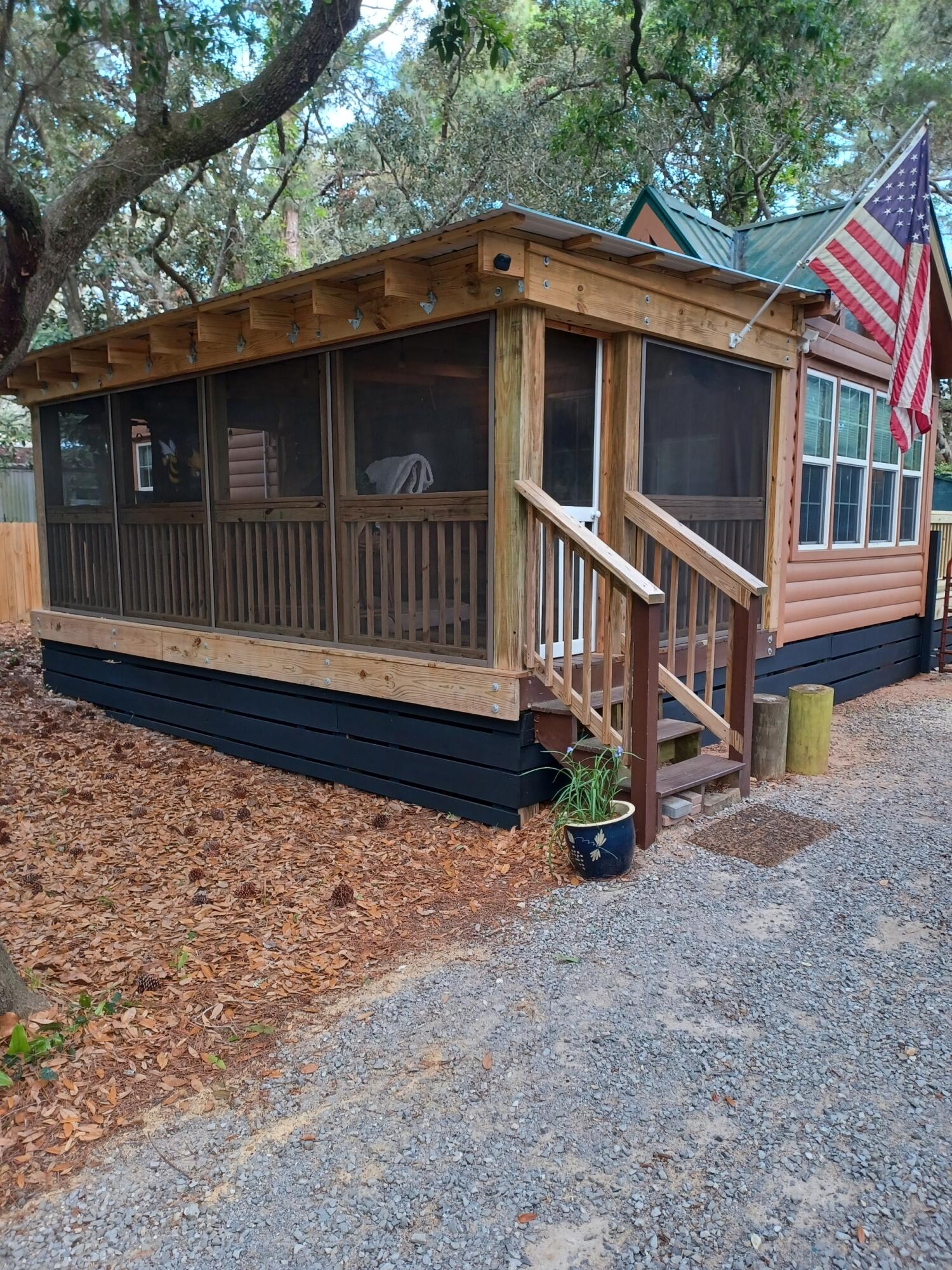 155 Madge Lane Santa Rosa Beach, FL 32459 - Photo 2 of 17 a view of a house with a yard