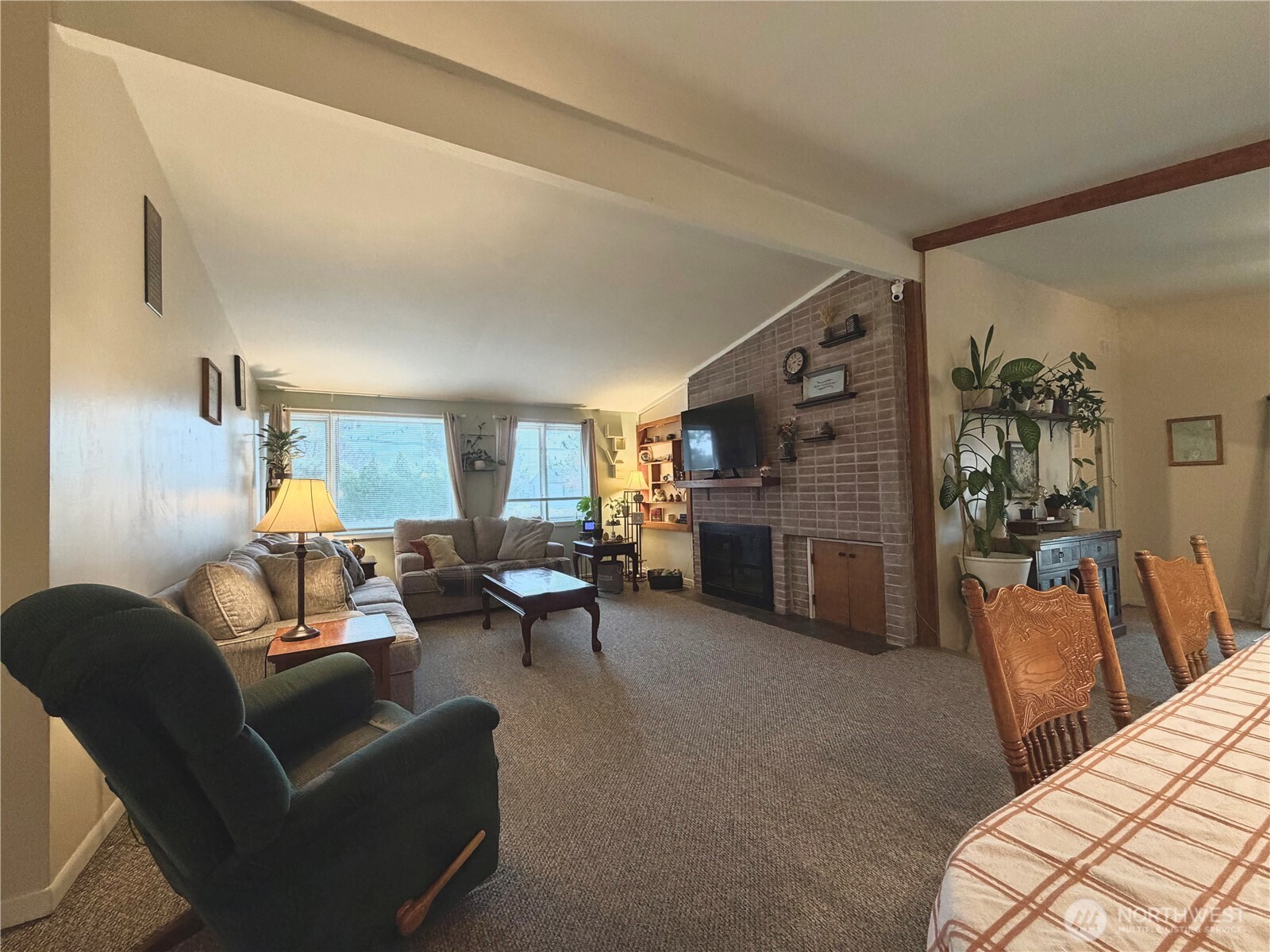 541 Fairchild Loop Moses Lake, WA 98837 - Photo 14 of 35 a living room with furniture and a fireplace