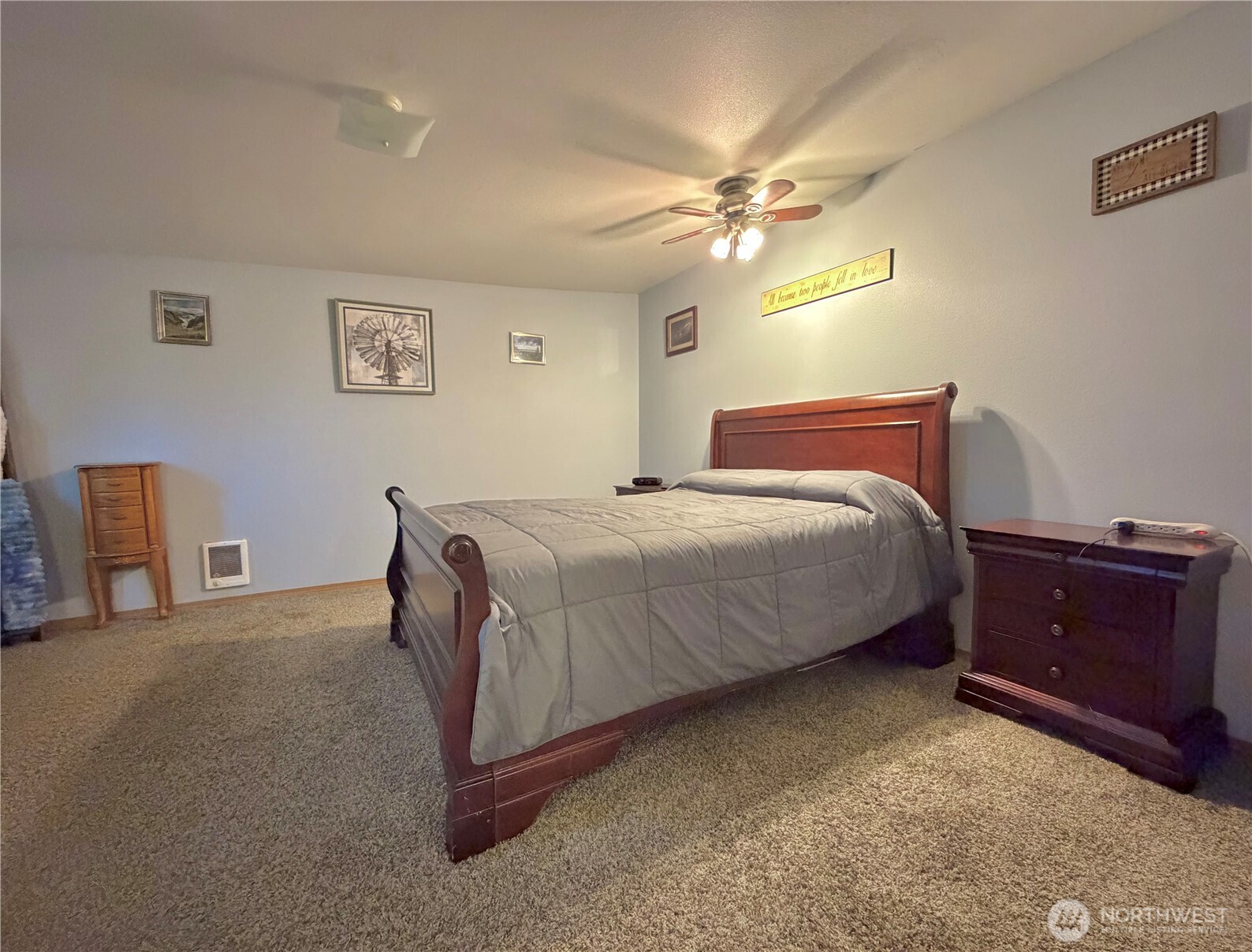 541 Fairchild Loop Moses Lake, WA 98837 - Photo 22 of 35 a bedroom with a bed and cabinet