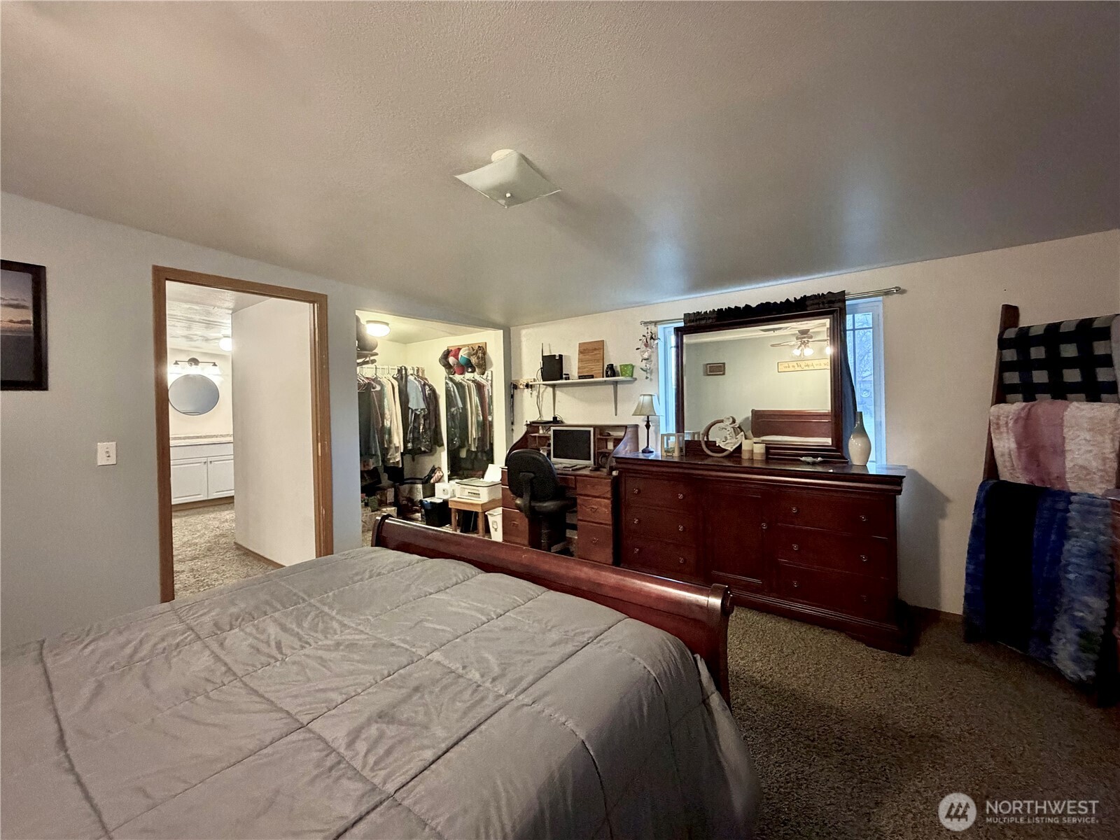 541 Fairchild Loop Moses Lake, WA 98837 - Photo 23 of 35 a bed room with a bed and a dresser